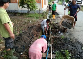 PAC LDII Gunung Ulin Bersama Warga Melaksanakan Bakti Sosial