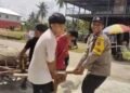 Saat Bhabinkamtibmas dan Warga LDII Bahu-Membahu di Hari Raya Kurban