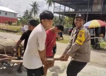 Saat Bhabinkamtibmas dan Warga LDII Bahu-Membahu di Hari Raya Kurban